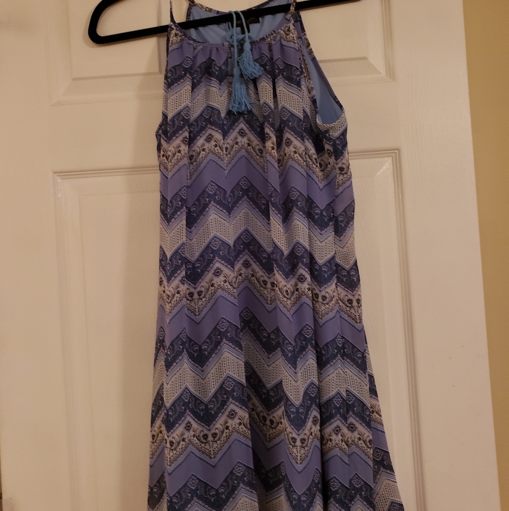 Adorable dress with lots of blues.